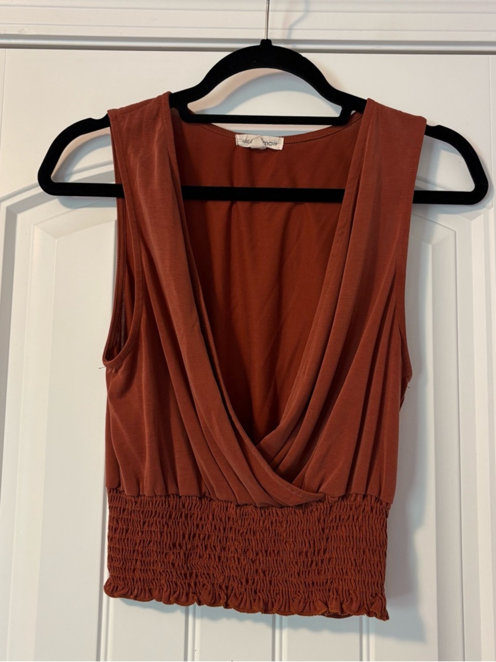 Sleeveless Draped V-Neck